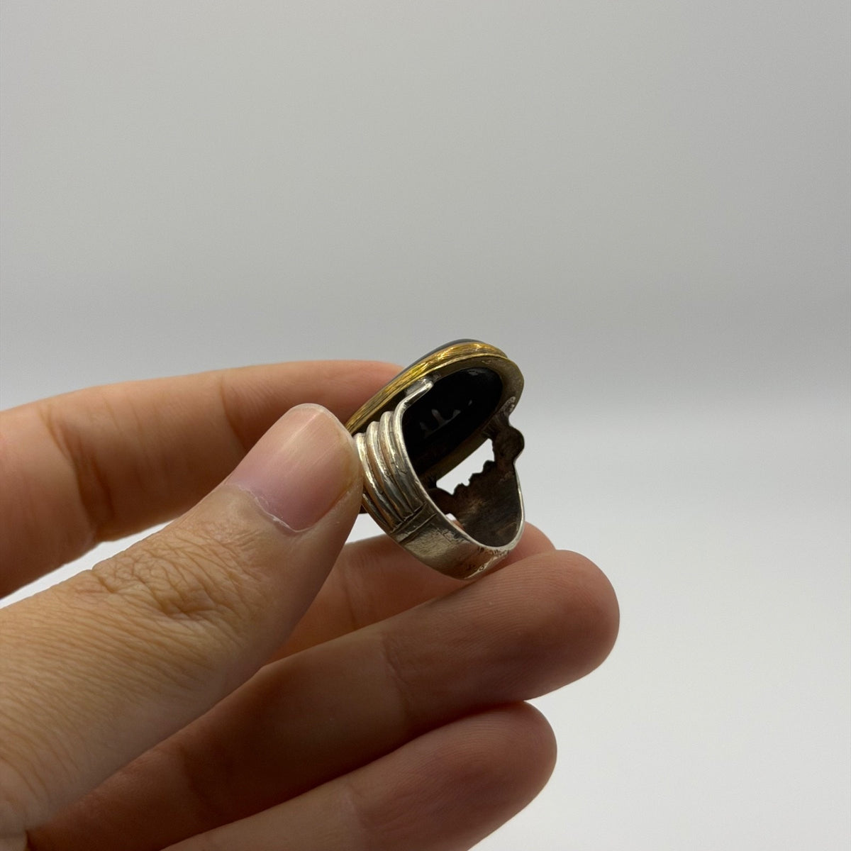 Silver Ribbed Band Ring with Oval Black Onyx Stone