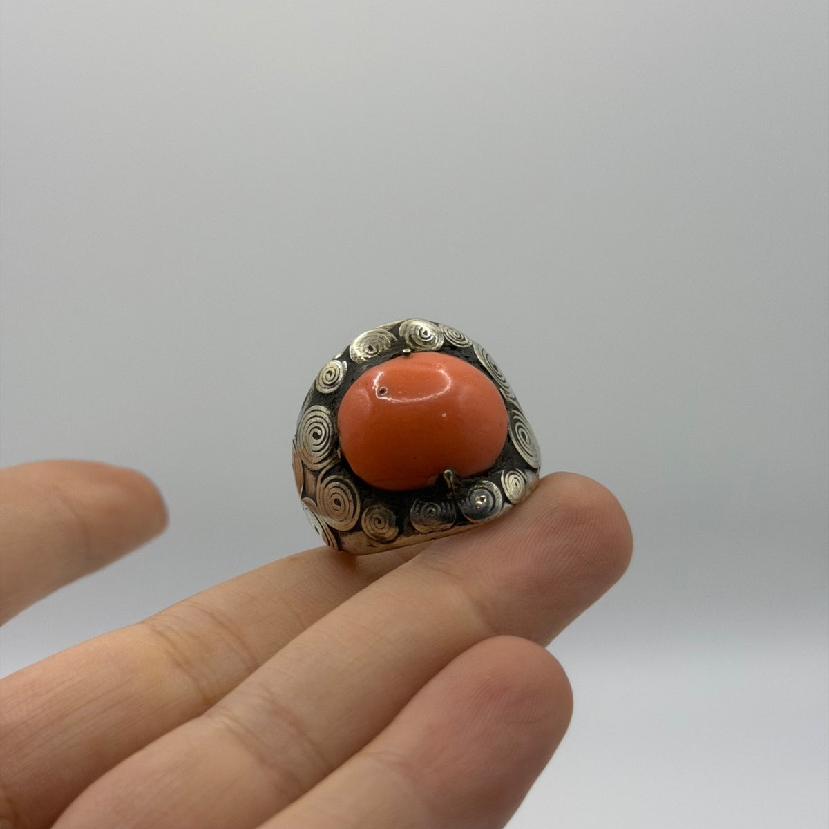 Silver Swirl Design Ring with Round Coral Cabochon