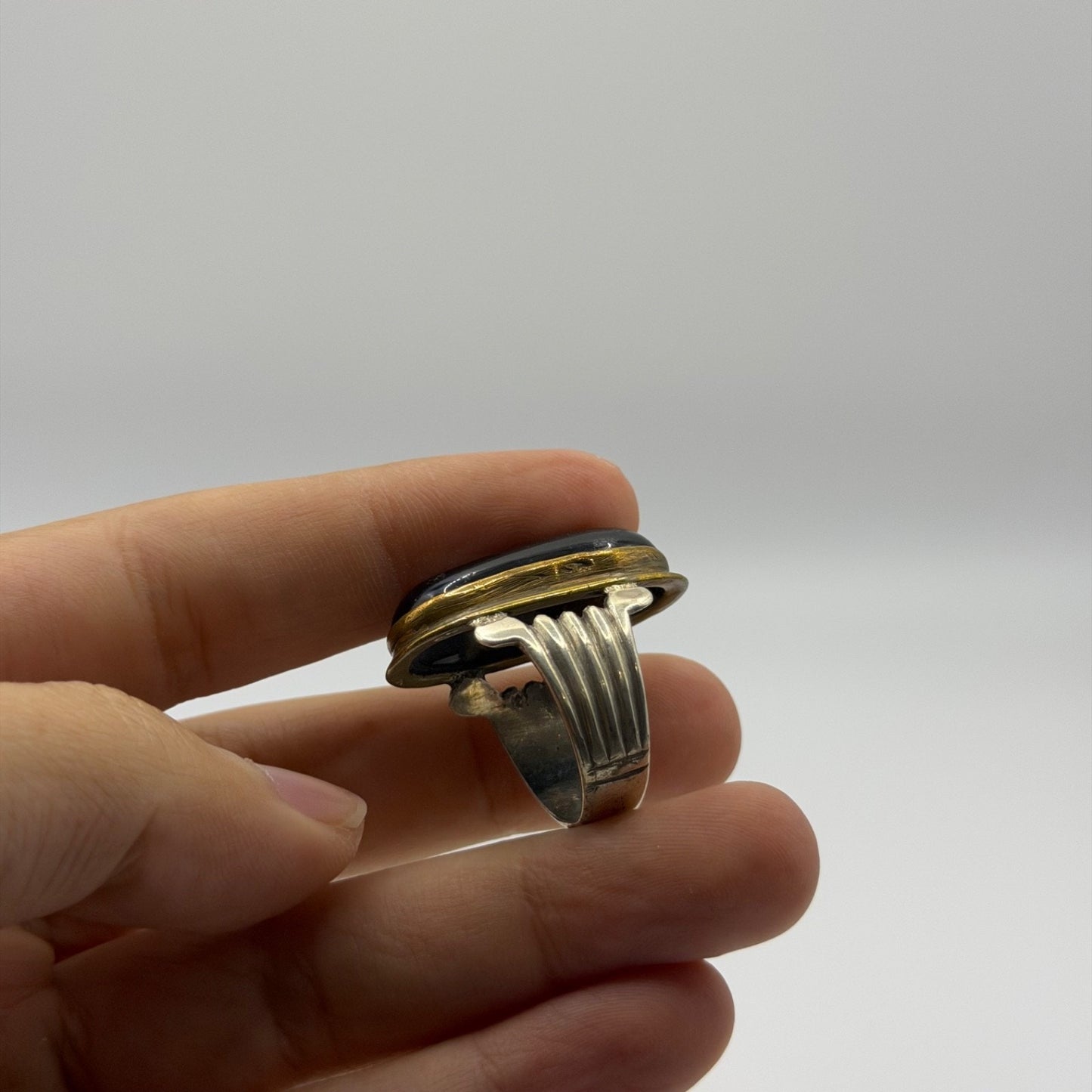 Silver Ribbed Band Ring with Oval Black Onyx Stone