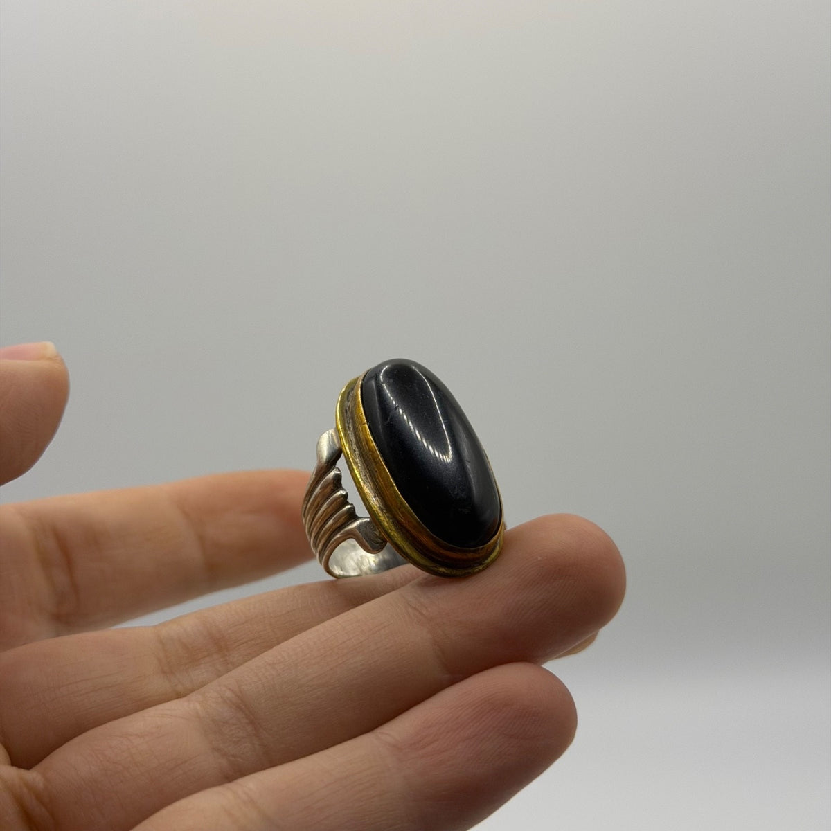 Silver Ribbed Band Ring with Oval Black Onyx Stone