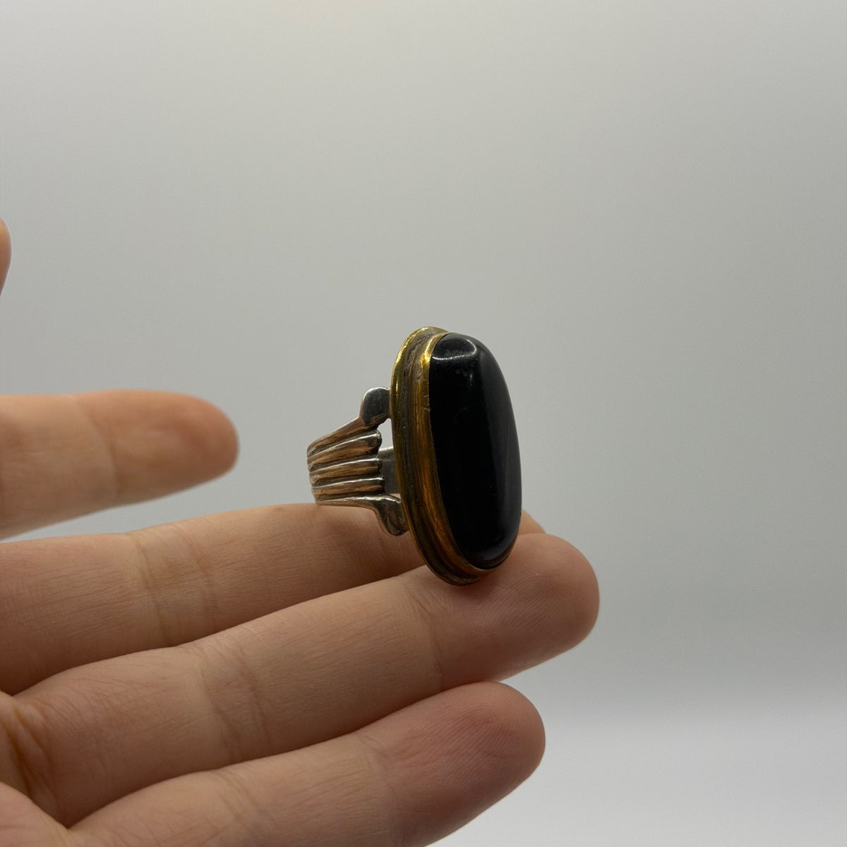 Silver Ribbed Band Ring with Oval Black Onyx Stone