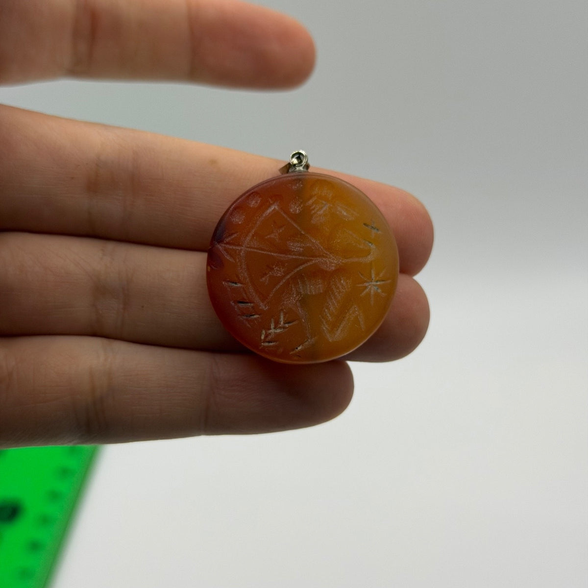 Vintage Carved Carnelian Agate Disc Pendant – Hand Engraved Archer Zodiac Figure